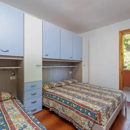 Апартаменти Villaggio Capistrano *